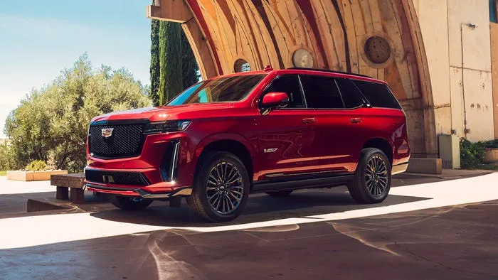 Black Cadillac Escalade ESV — rear three-quarter