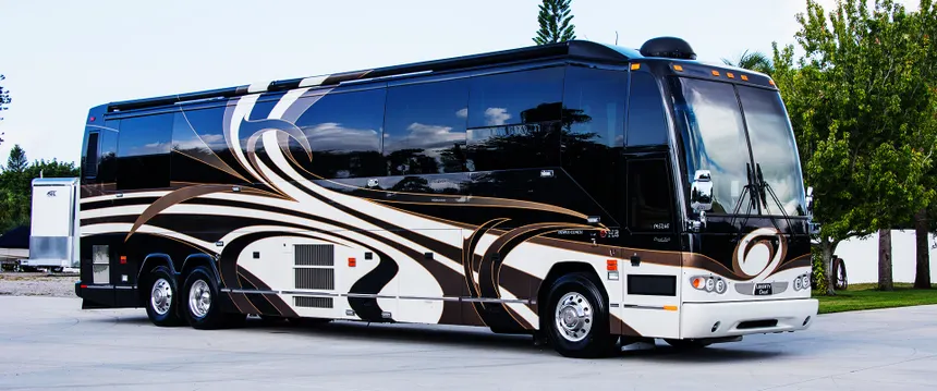 Executive motor coach — exterior side view