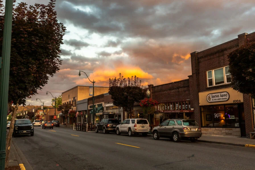 Executive black sedan parked near downtown Sumner historic district