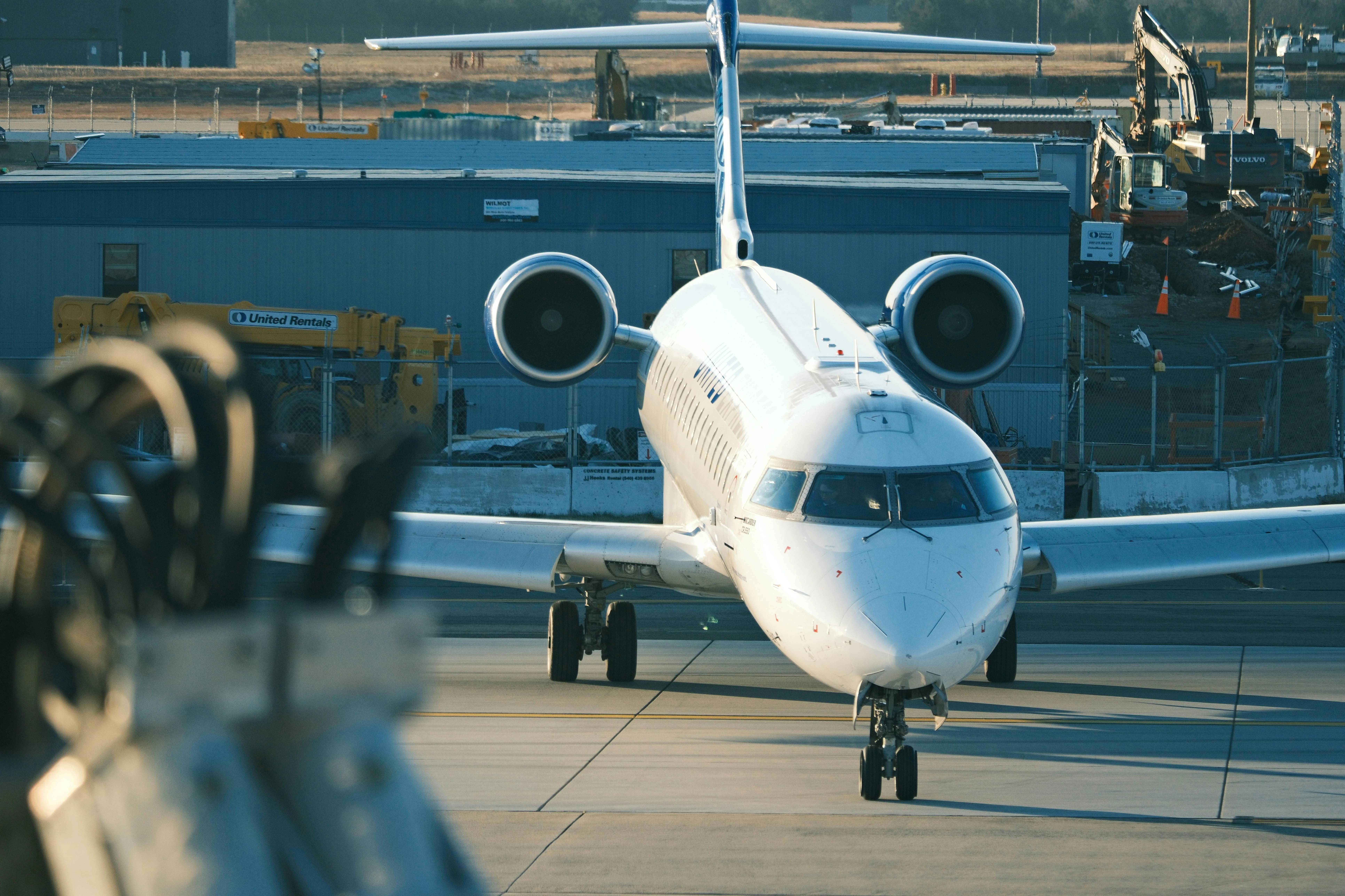 Luxury executive SUV awaiting private aviation passengers at Tacoma Narrows Airport